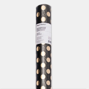 Schwarzes Geschenkpapier mit goldenen Punkten